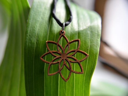 Lotus Flower Pendant in wood on leather cord